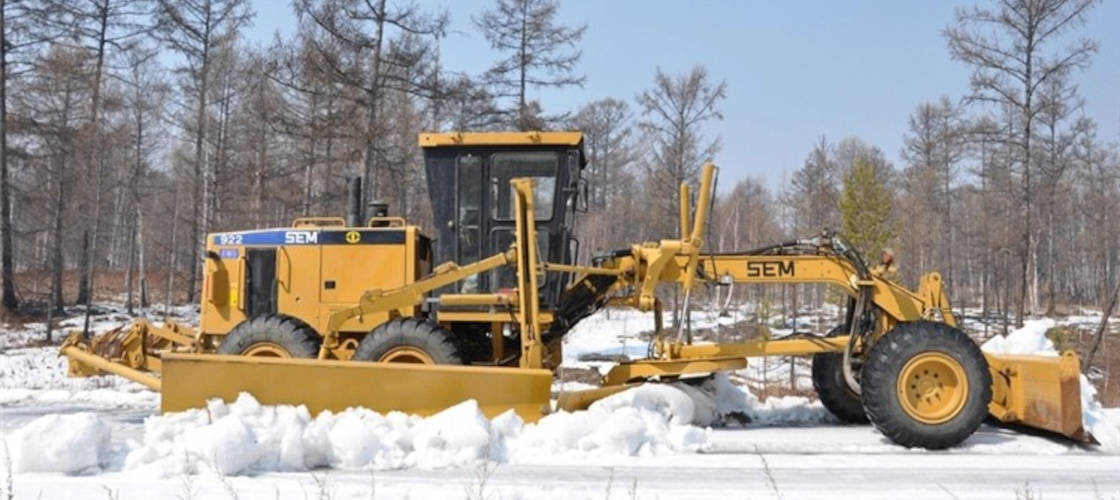 Прибирання снігу за допомогою автогрейдера